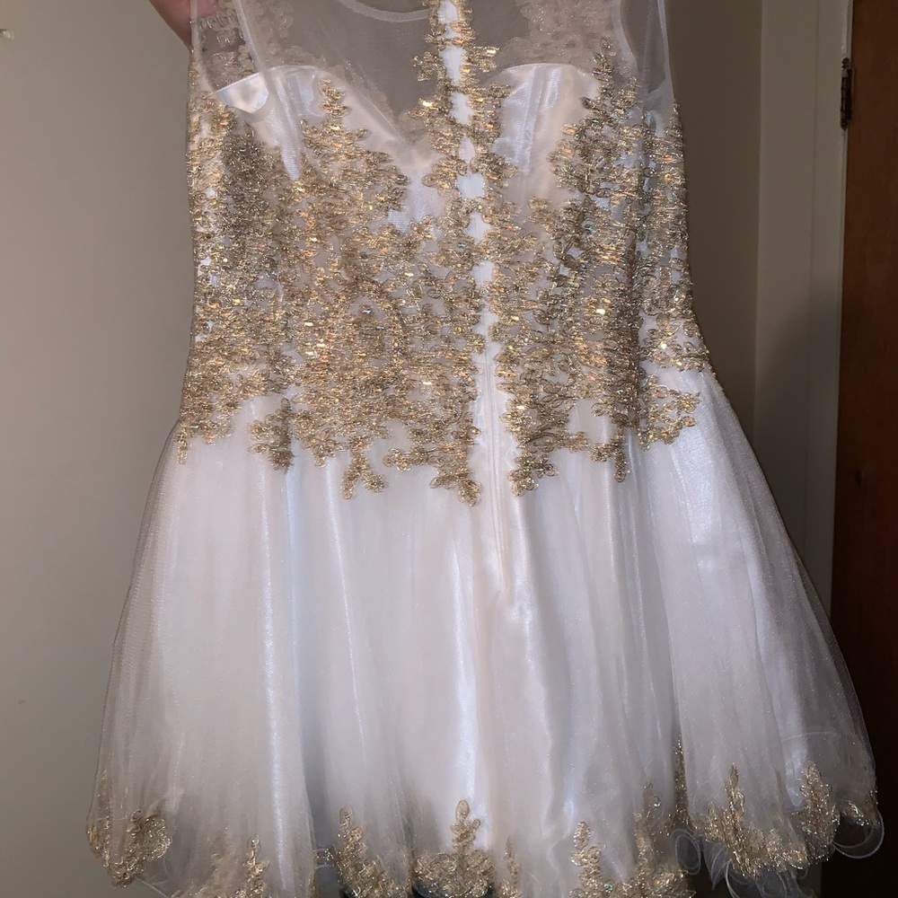 White dress with gold beads